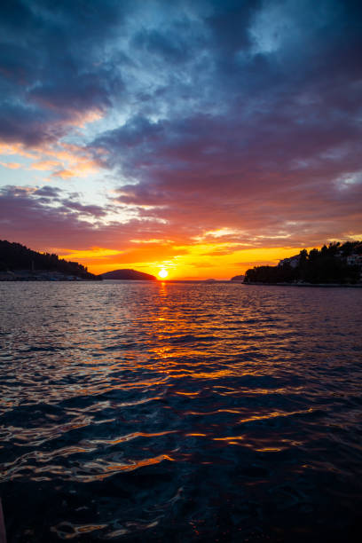 istock Beautiful orange sunset over sea in Croatia 1318300902