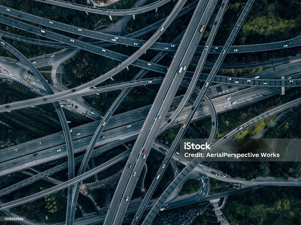 Aerial View of Complex Overpass and Busy Traffic Transportation Stock Photo