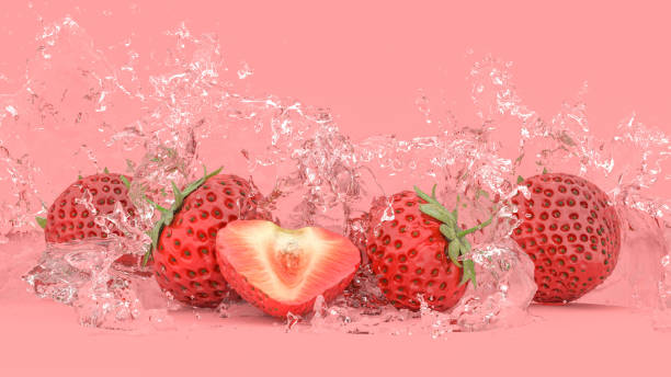 istock strawberries on a red background in splashes of water 1318303829