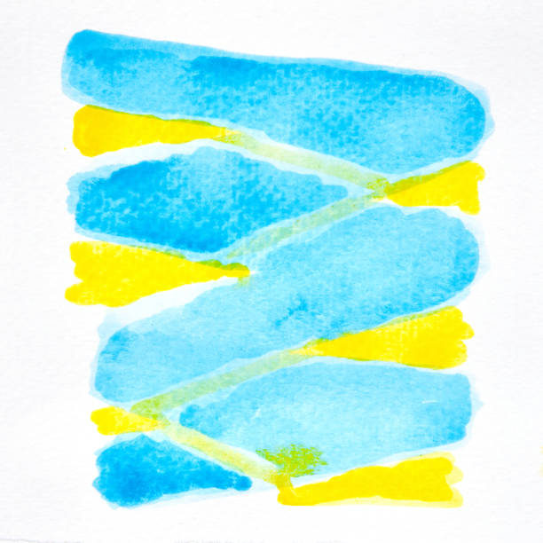 紙の上の抽象的な青と黄色の水彩の写真画像、背景のための青と黄色の水彩の手のペンキ、違いの色を混ぜる紙の湿った技術 - blob watercolor painting spotted ink ストックフォトと画像