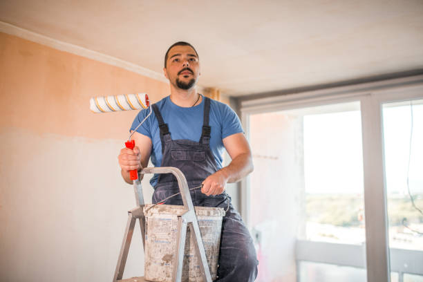istock Photo of painter during painting 1318313840