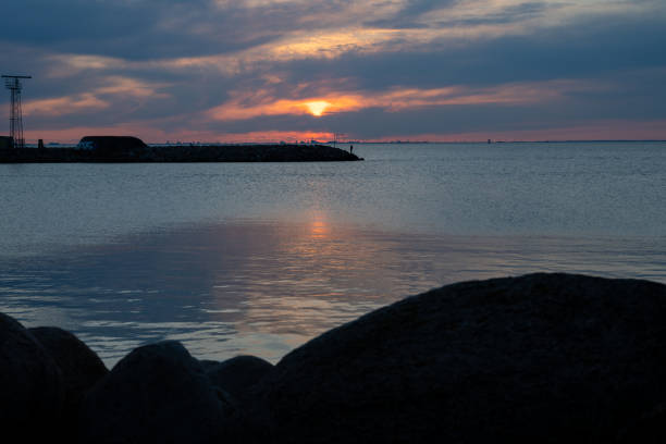 istock Beautiful sunset over the ocean. Picture from Malmo, Sweden 1318316092