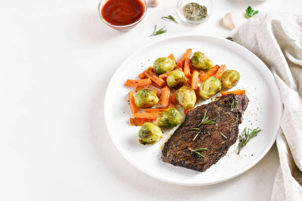 Grilled beef steak with brussels sprouts