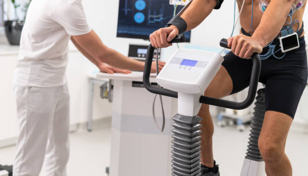 istock Male Athlete Performing ECG And VO2 Test On Indoor Bicycle 1318316186
