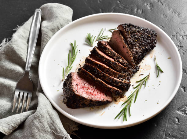 istock Grilled beef steak with brussels sprouts 1318316274