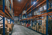 supermarket warehouse with rack, shelf storage carton, box, cardboard box and tin