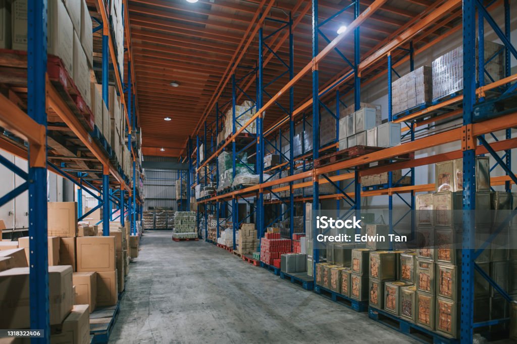 supermarket warehouse with rack, shelf storage carton, box, cardboard box and tin Warehouse Stock Photo