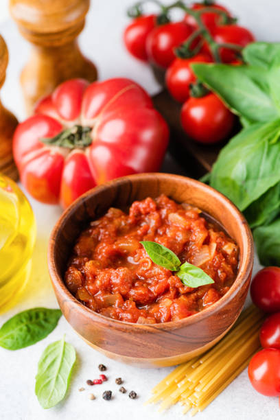 istock Tomato sauce marinara and ingredients 1318322850