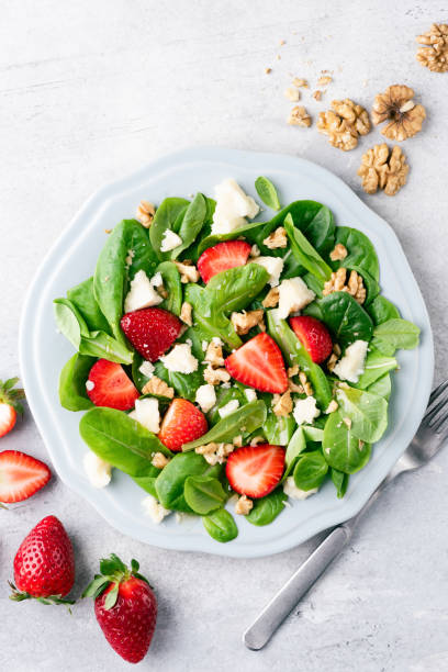 istock Healthy salad with strawberries 1318323373