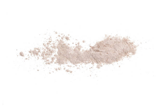istock Beige cosmetic or make up powder isolated on white. 1318325106