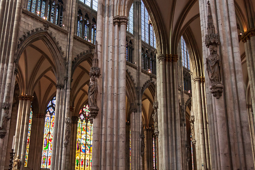 Interior view of the Historic Roman Catholic cathedral located in the city of Cologne, Germany is the largest Gothic church in northern Europe with twin towers that rise 515 feet (157 metres) into the sky. The cathedral was designated a UNESCO World Heritage Site in 1996.