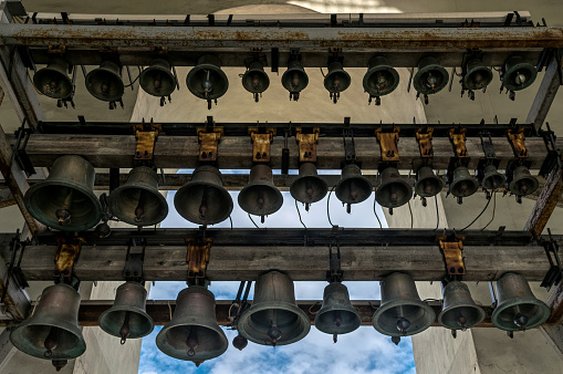 Kyiv, Ukraine - May 14, 2021: Ancient bronze and copper domes in the bell tower of St. Sophia Cathedral in Kiev, Ukraine. The famous historical monument, built by Prince Yaroslav the Wise in Kievan Rus, 1037. Ancient Christian Orthodox churches with golden domes, Byzantine style of architecture. National reserve \