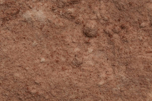 istock Cosmetic clay or face powder textured background, close up 1318326022