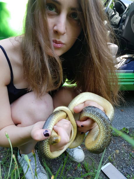 Young girl with snake