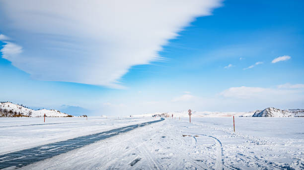 The winter road on Lake Baikal is laid directly on the snow-covered ice and is very popular among motorists.