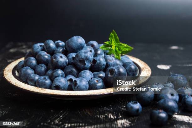 Fresh Blueberry Fruit On A Plate Stock Photo - Download Image Now - Bilberry - Fruit, Blueberry, Fruit