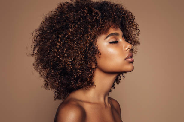 istock Beautiful girl with curly hairstyle 1318343826