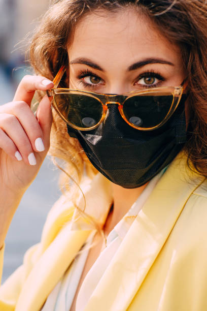 istock Woman with protective face mask 1318344031