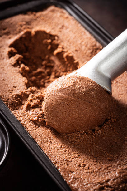 istock Chocolate ice cream scoop ball serving ice-cream macro close-up 1318351523