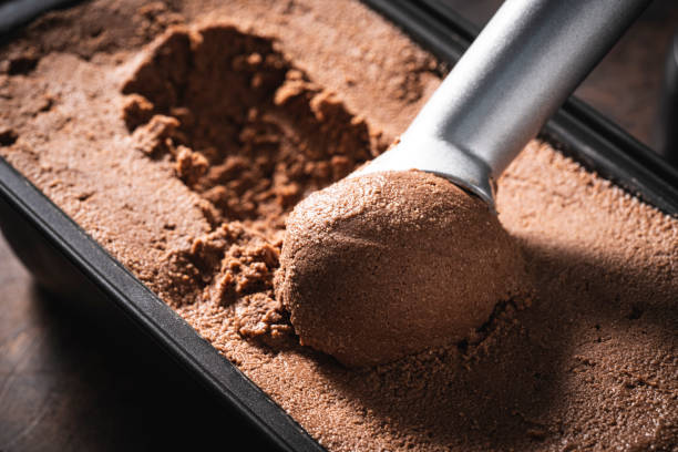 istock Chocolate ice cream scoop ball serving ice-cream macro close-up 1318351527