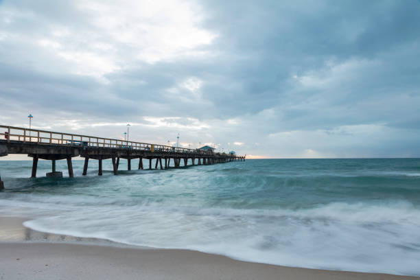istock Pompano Beach Pier Broward County Florida by stormy weather 1318352521