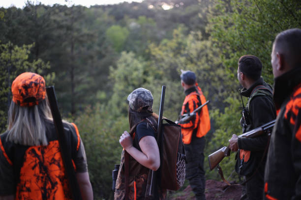 istock Hunters in the forest stock photo 1318357177