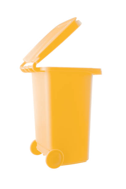 istock Plastic yellow trash can isolated on white background 1318359223