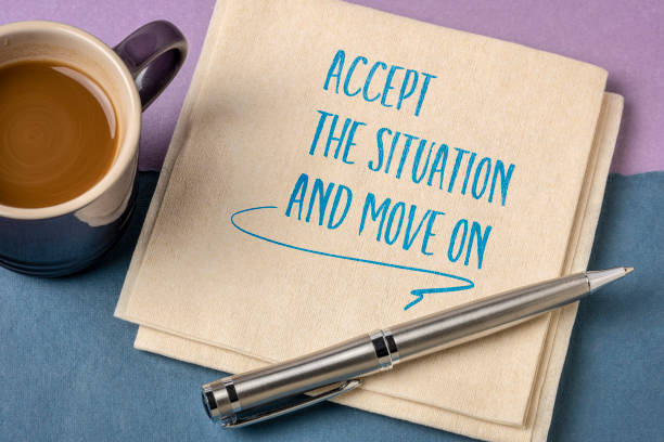 istock accept the situation and move on - inspirational handwriting on a napkin 1318362649