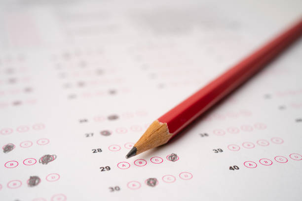 istock Answer sheets with Pencil drawing fill to select choice, education concept 1318363648