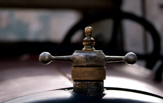 Radiator cap/hood ornament from an antique car.
