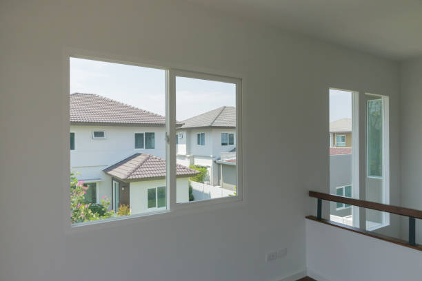 istock Empty room with glass window frame house interior on concrete wall 1318372654