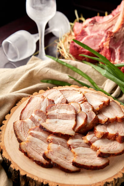istock Roasted pork belly sliced on wooden plate 1318373356
