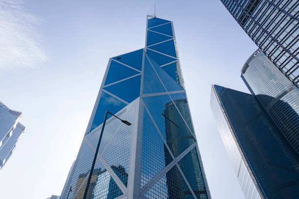 Bank of China Tower in Central, Hong Kong Hong Kong - November 2020 : Bank of China Tower in Central.  The building consisting of triangular frameworks covered by glass curtain walls. Low Angle View the bank of china tower stock pictures, royalty-free photos & images