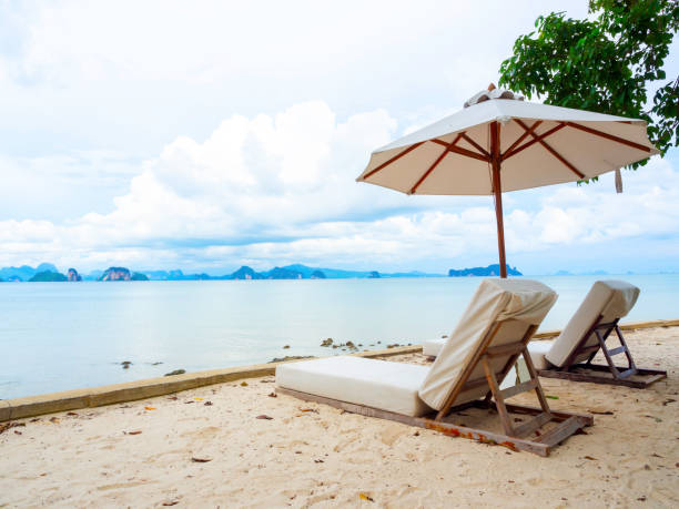 istock Couple sunbed with seascape view. 1318379911