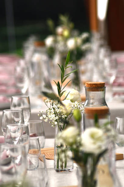 istock A vase of white flowers on a wedding table. 1318381463