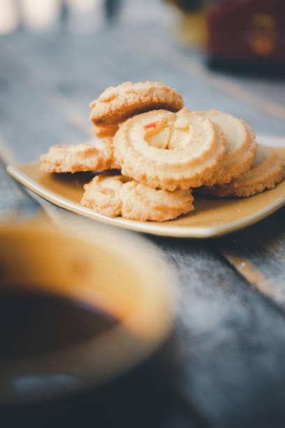 istock Danish butter cookies on a wooden table. Selective focus 1318383082
