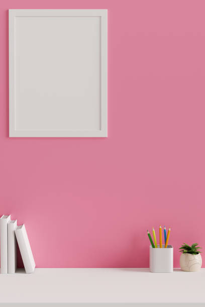 istock White pink concept working space with stationery and mock-up frame on the pink wall, 3D rendering 1318383305