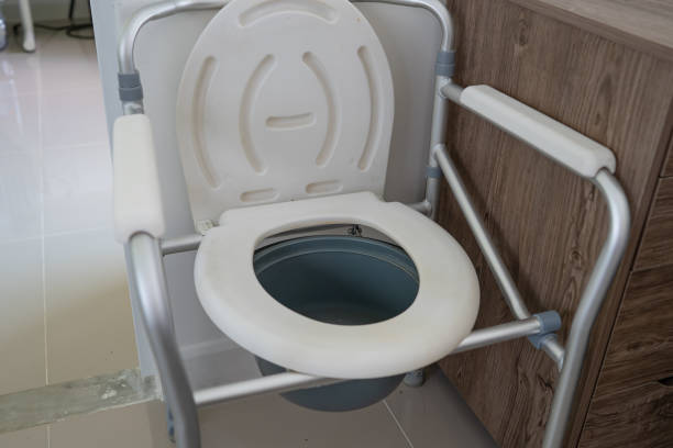 istock Commode chair or mobile toilet can moving in bedroom or everywhere for elderly old disabled people or patient in hospital, healthy strong medical concept 1318386439