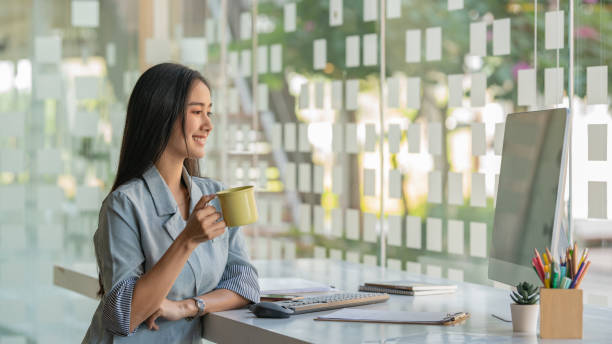 istock woman drinking coffee in a cafe 1318386703