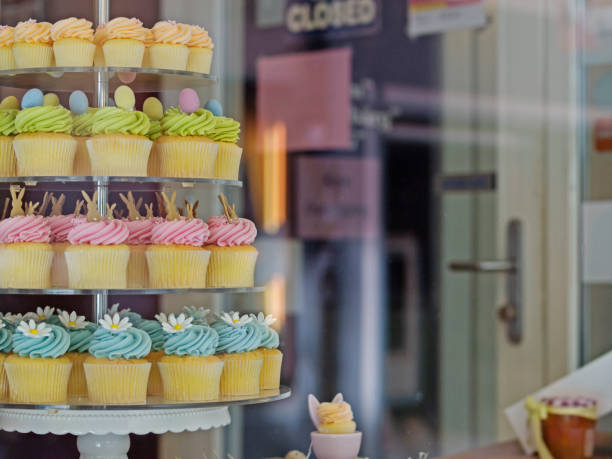 istock Cupcakes in the shop window 1318392989