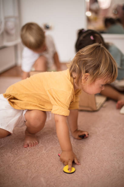 istock Group of kids playing interactive games. 1318397636