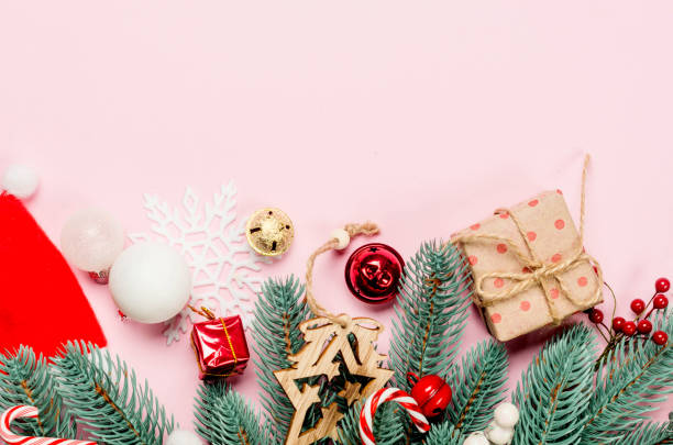 istock Christmas set with white and red balls and decorations on pink. 1318398326