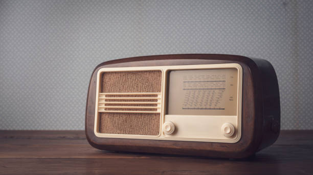 istock Vintage radio and retro wallpaper 1318399334