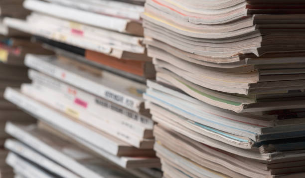istock Stacks of magazines close up 1318399857