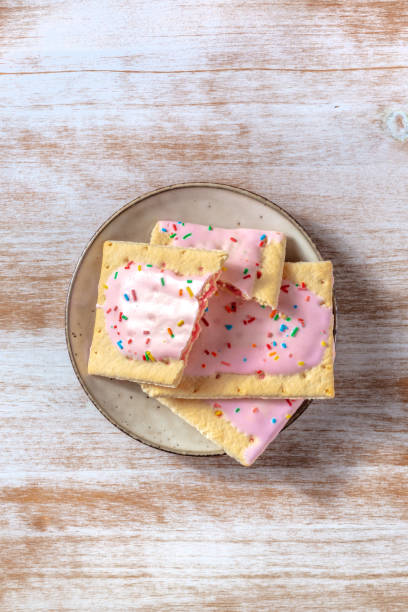 istock Pop tarts on a plate, shot from above on a wooden table 1318400871