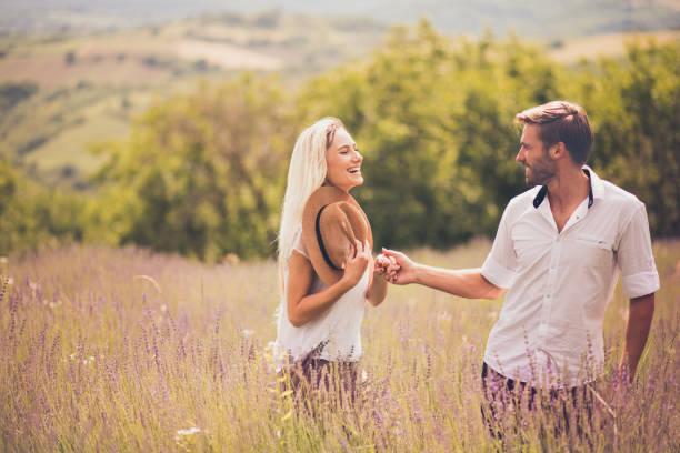 istock Young Couple in lavender field. 1318402105