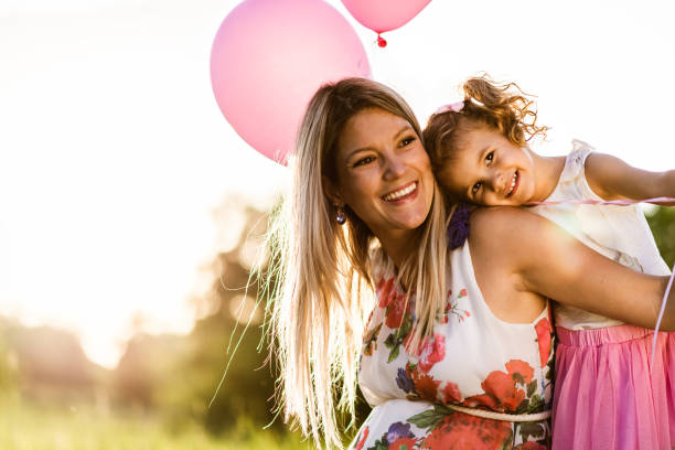 istock Pregnant mother and her daughter sharing love 1318409401
