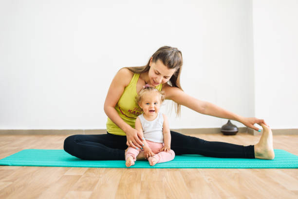 everything is more fun with kids. - small gymnastics athlete action imagens e fotografias de stock