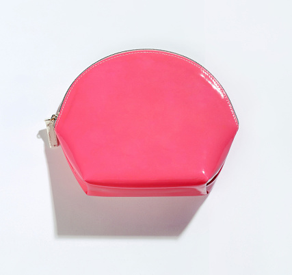 Blank pink beautician bag for cosmetics with zip, clipping path, white background