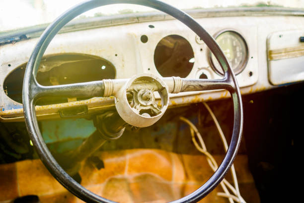 istock The steering wheel of an old rusty passenger car. 1318412770